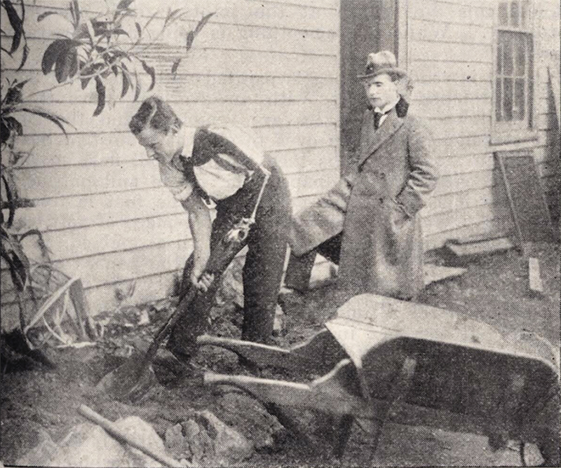 A trainee with an Amar prosthetic shovelling dirt outside the Society’s depot, August 1919. 'Repatriation' Vol. 1, No. 7, 1919.