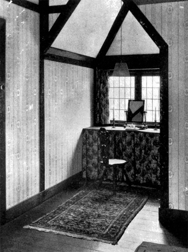 Original caption: "The dressing-table is neatly tucked into the dormer."